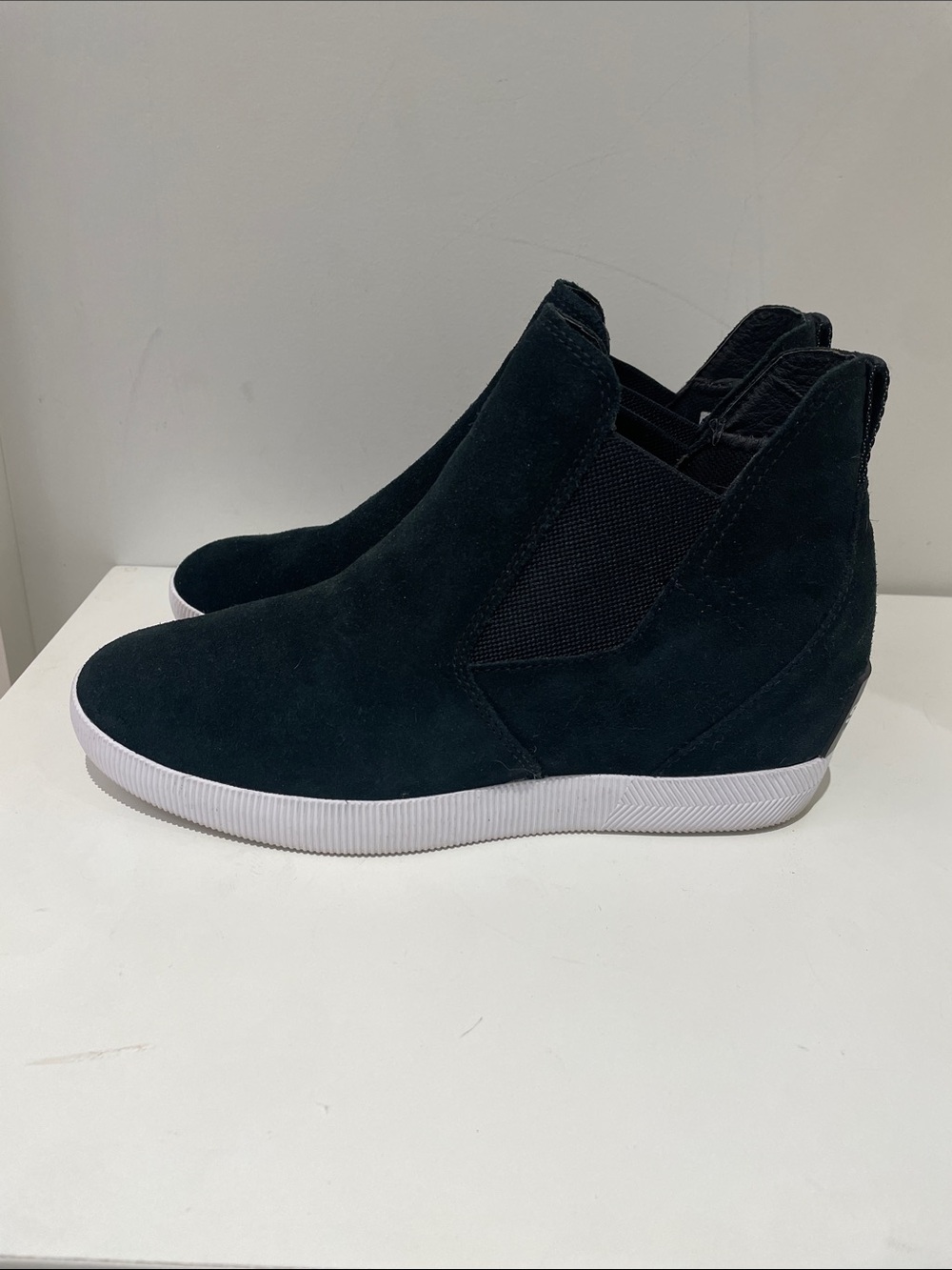 Women’s Sorel black suede wedge Chelsea ankle boots.